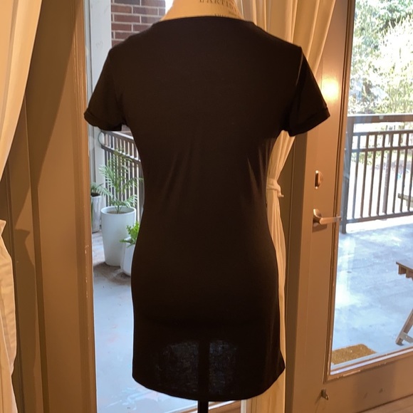 Small black shortsleeve dress with cut outs and knots at stomach waist level​ - Picture 3 of 8